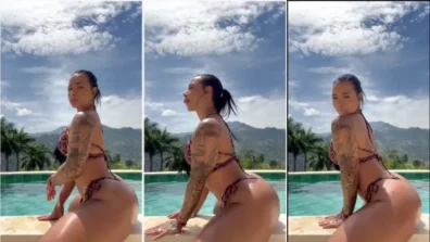 Jennifer Sánchez en el borde de la piscina balanceando el Popozão